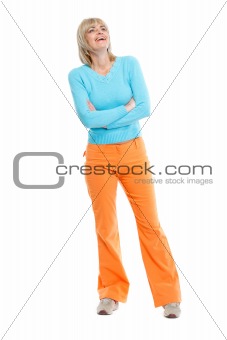 Full length portrait of laughing middle age woman