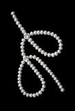 White pearls on the black velvet 