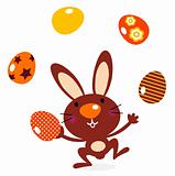 Cute jumping bunny juggling with eggs