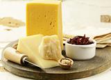 cheese platter with nuts and jam