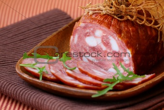 luxury brand smoked sausage on a wooden board