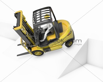 Yellow fork lift truck falling after turning on slope