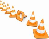 Diagonal line of traffic cones with one fallen cone