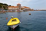 Yellow Boat in Mediterranean Town Senj in Croatia