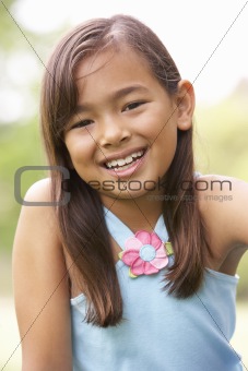 Portrait Of Young Girl In Park