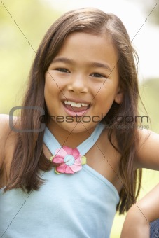 Portrait Of Young Girl In Park