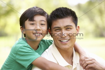 Father And Son In Park