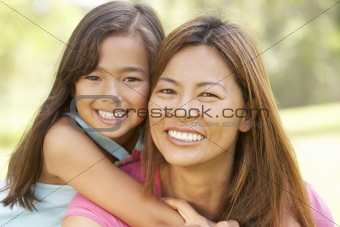 Mother And Daughter Enjoying Day In Park