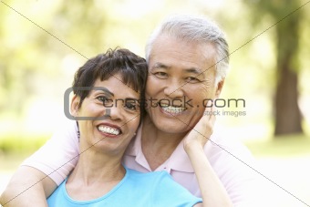 Portrait Of Senior Couple In Park