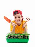 Young boy learning to grow food
