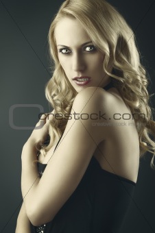 sexy blond woman with aggressive expression