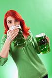 Redhead enjoying green beer