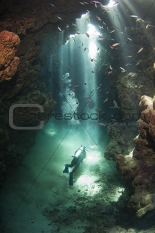 Scuba diver in an underwater cave