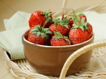 Ceramic bowl with ripe fresh strawberries