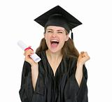 Excited graduation student girl with diploma