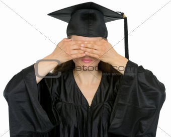 Graduation student girl making see no evil gesture