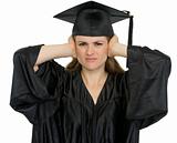 Graduation student girl making hear no evil gesture