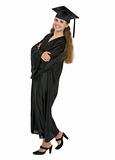 Full length portrait of happy graduation student woman