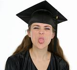 Portrait of graduation student girl showing tongue