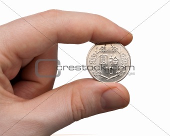 Holding a 10 NT Dollar Coin