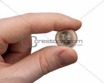 Holding a 1 NT Dollar Coin