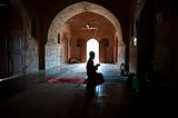 Man praying in Mosque