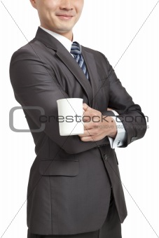 smiling businessman holding coffee cup