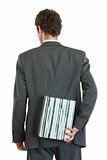 Modern businessman standing back to camera and holding gift box
