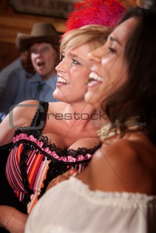 Three Laughing Women in a Saloon