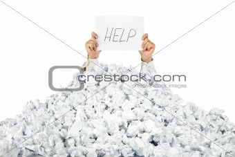 Person under crumpled pile of papers with a help sign / isolated