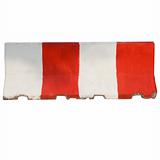 The red and white concrete barriers