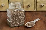 jar and tablespoon of chia seeds