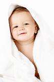 Studio Portrait Of Baby Boy Wrapped In Towel