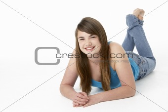 Studio Portrait Of Happy Teenage Girl