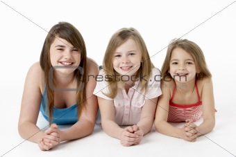 Three Girls Piled Up In Pyramid In Studio