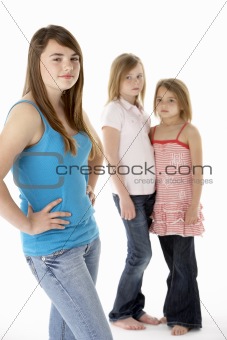 Group Of Girls Together In Studio Looking Unhappy