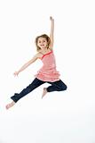 Young Girl Jumping In Mid Air