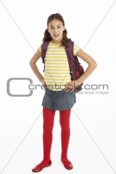 Studio Portrait Of Young Girl With Backpack