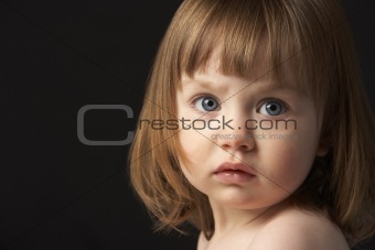 Close Up Studio Portrait Of Sad Young Girl