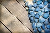 blue stones wooden boards background