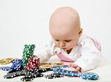 Baby playing poker chips