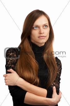 Portrait of a smiling thinking woman looking up