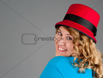 smiling fat woman on gray background