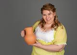 cute fat woman with a pitcher of milk