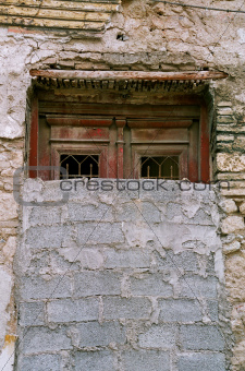 bricked up vintage door and grungy wall