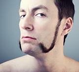 man with sideburns 