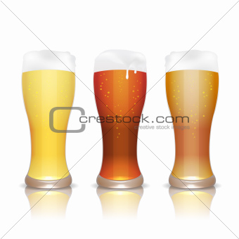 Light, dark and unfiltered beer in glasses