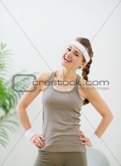 Portrait of smiling athletic woman