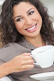 Happy Hispanic Woman Smiling Drinking Tea or Coffee