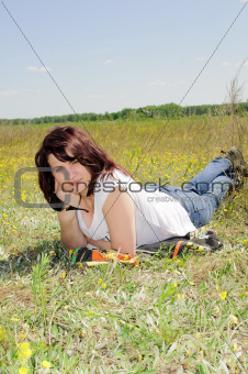 Woman resting on the grass
